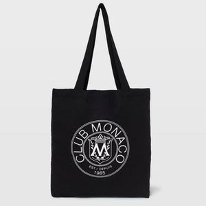 Club Monaco shopping tote/book bag. With classic crest logo.